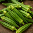 Organic okra in a rustic container – export-quality ladies’ finger vegetable